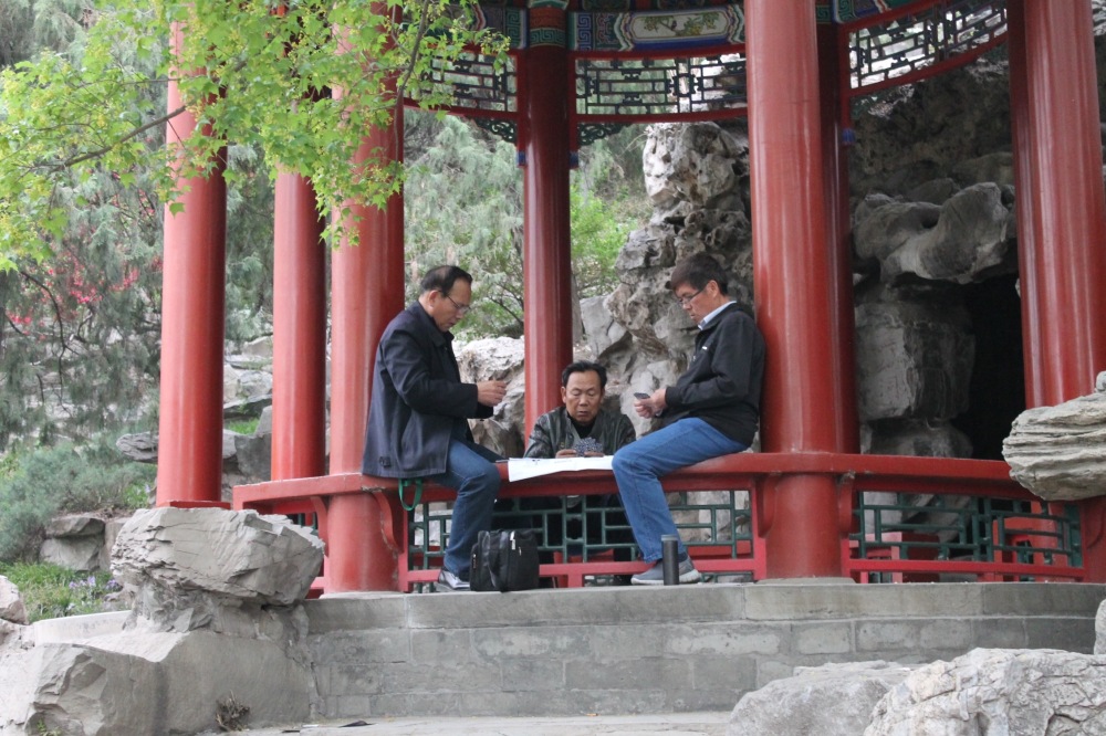 Men playing cards in Beihai park